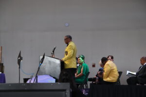 A man speaking at a podium.