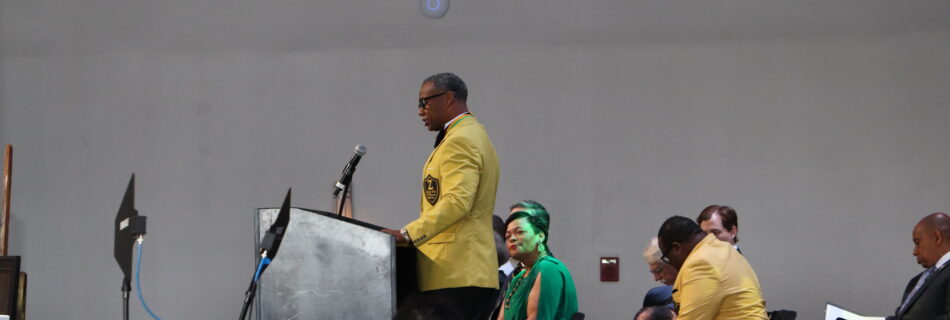 A man speaking at a podium.